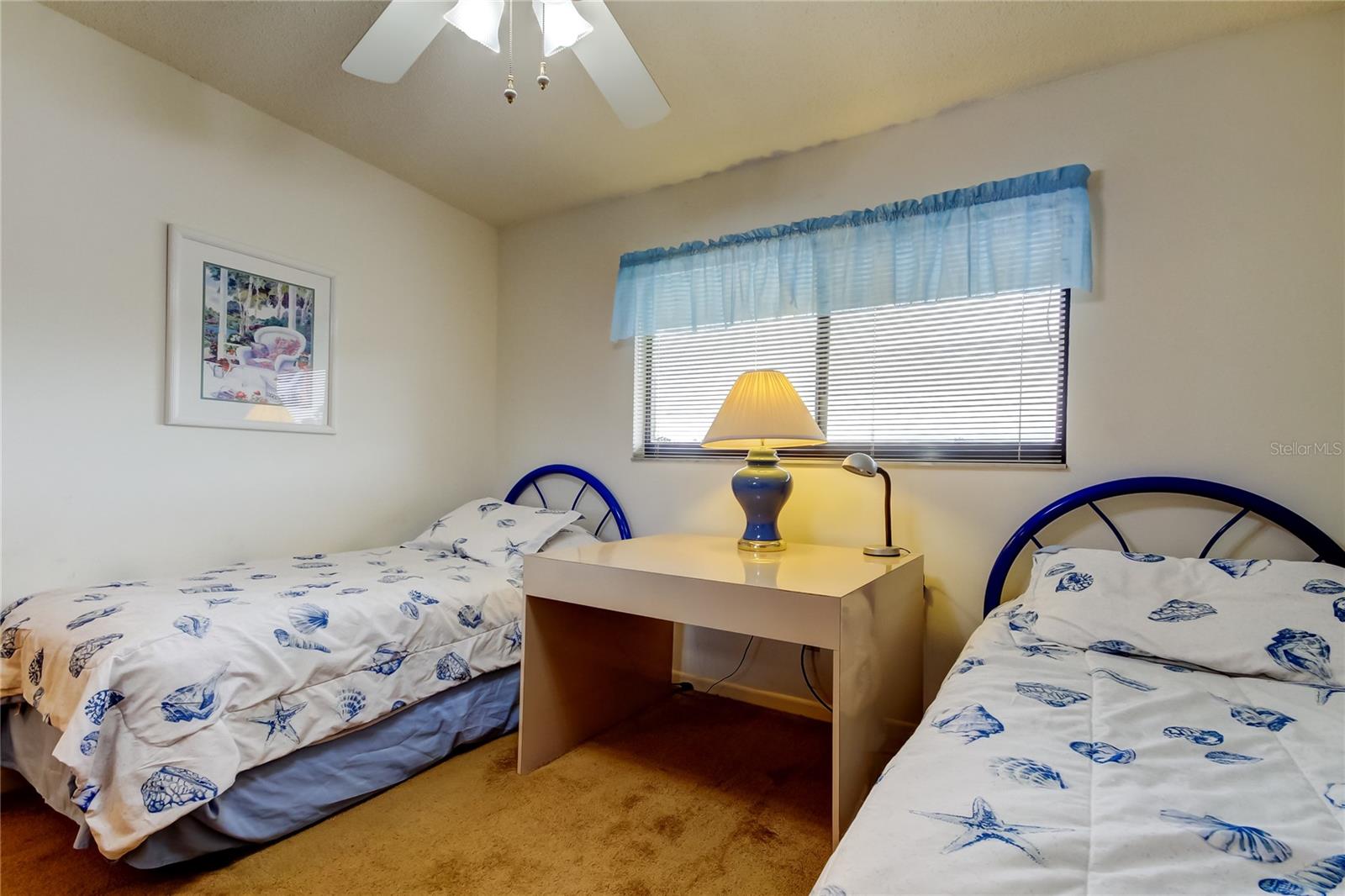 43. Guest Bedroom (10.2' x 11.10') is On West Wall.. Features Large Walk In Closet & 2 Cool Twin Beds for Guests!