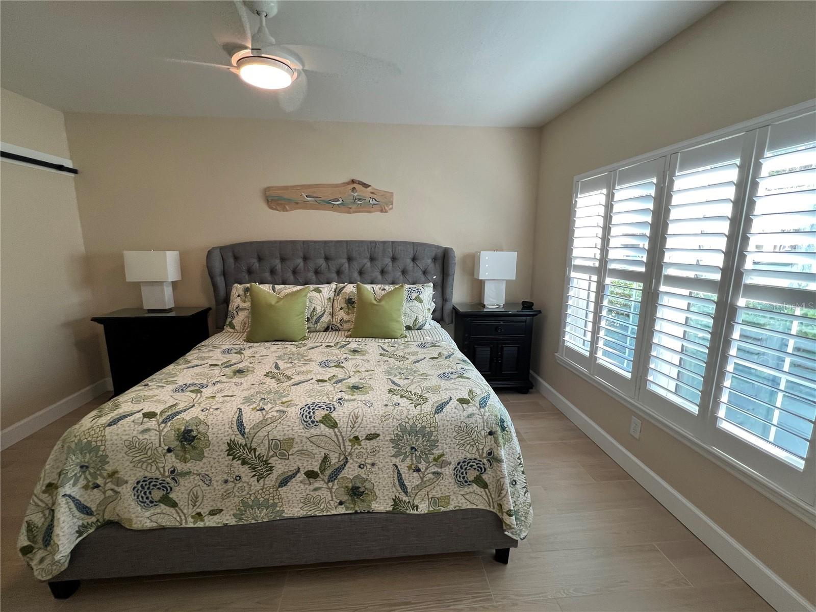 Master Bedroom with beautiful plantation shudders