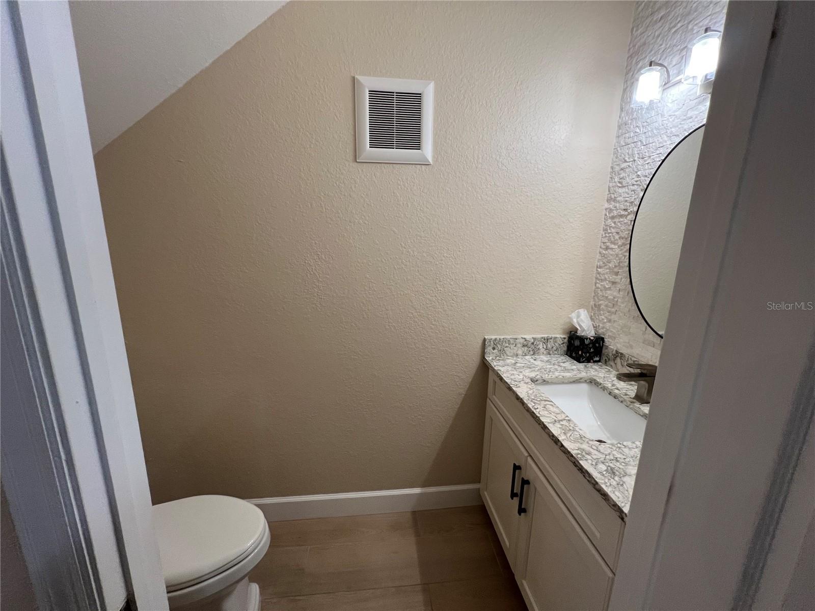 Half bath under stairs