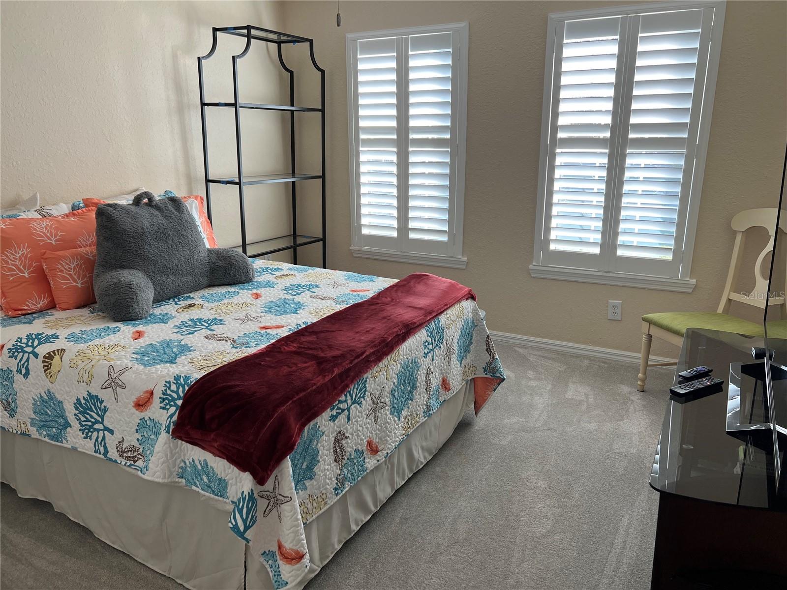 3rd bedroom with plantation shudders