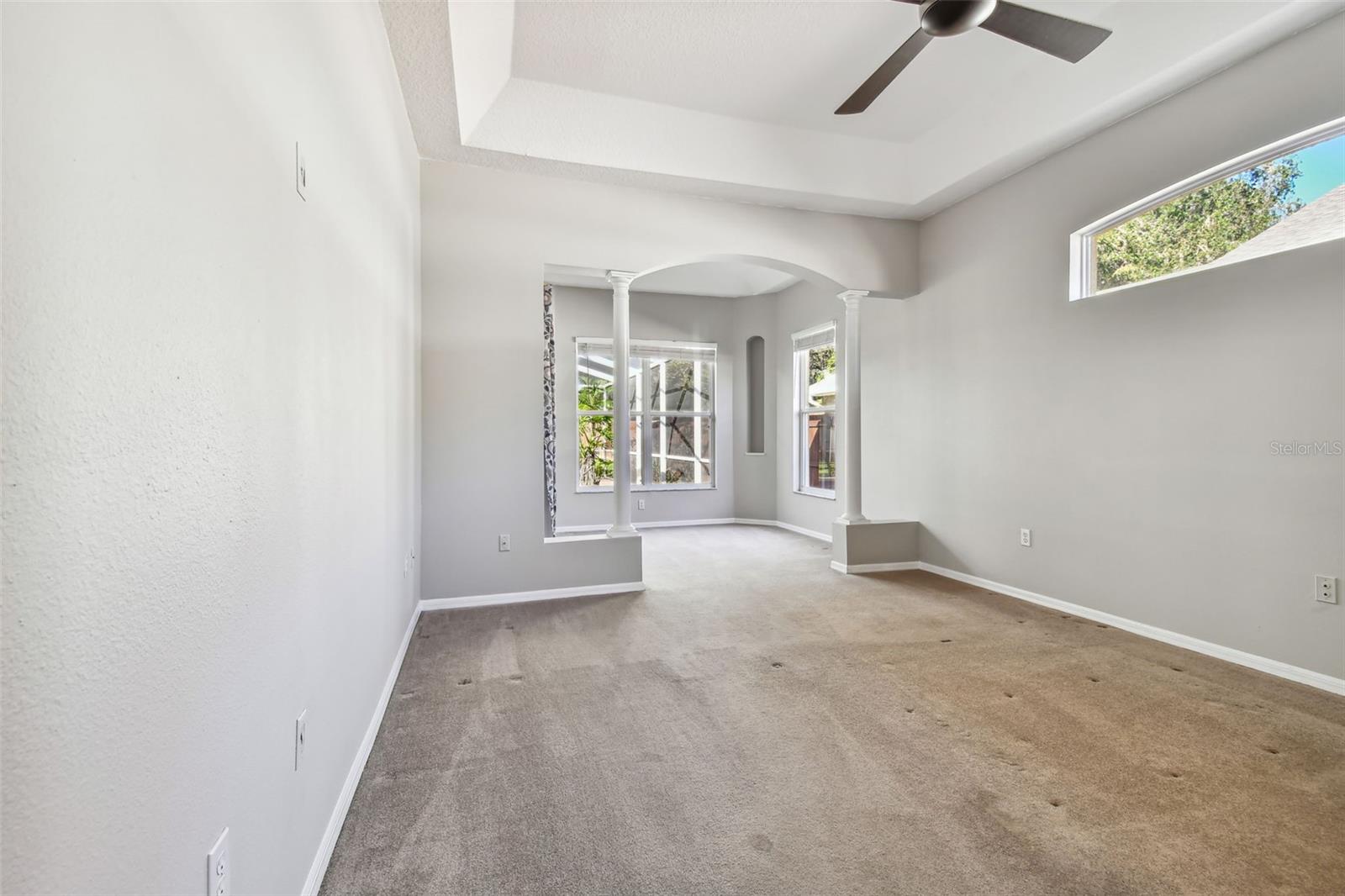 Primary bedroom is oversized with a sitting room at one end.