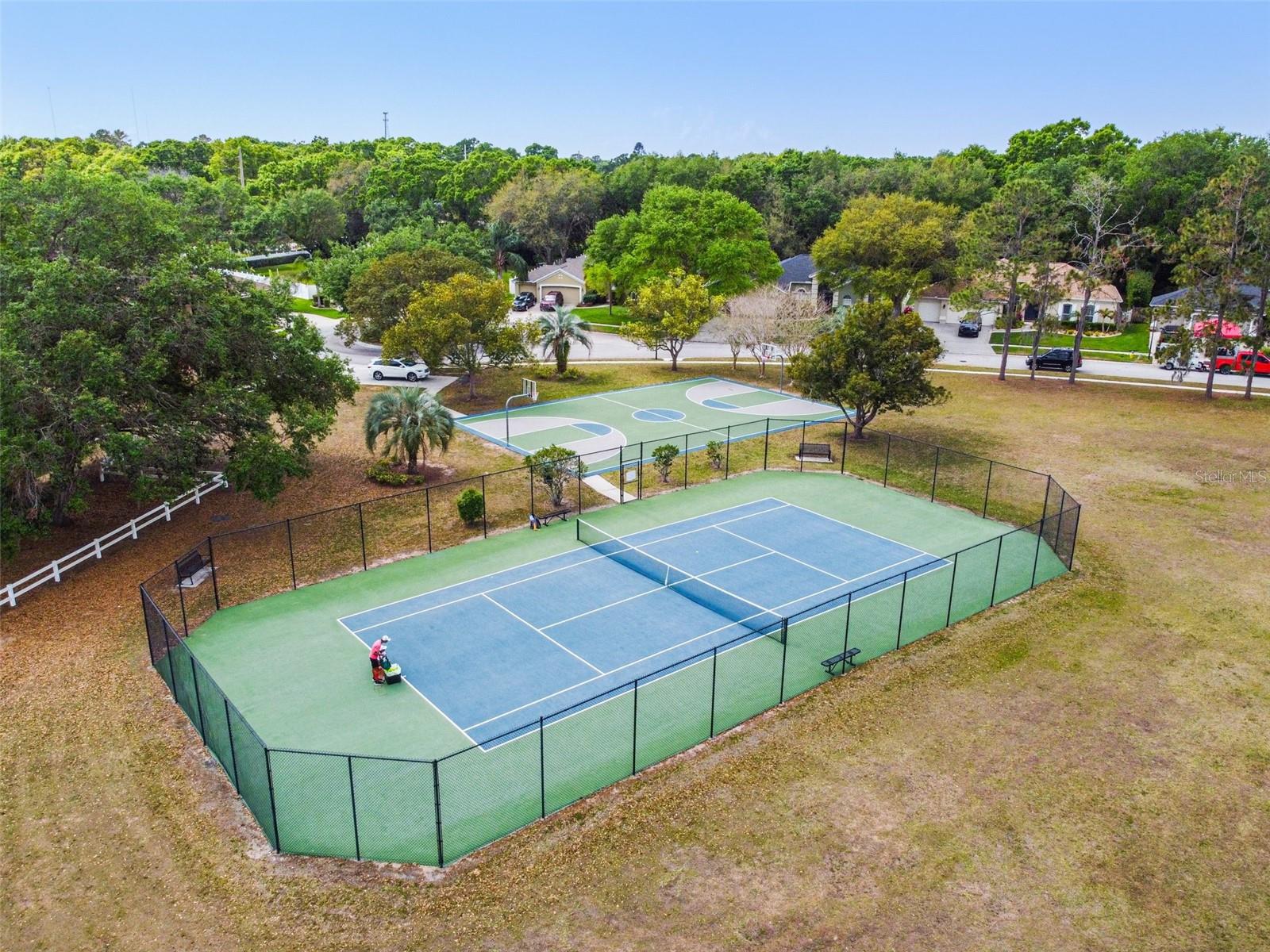 Tennis anyone?  This tennis court and full basketball court are for Twin Lakes residents only.