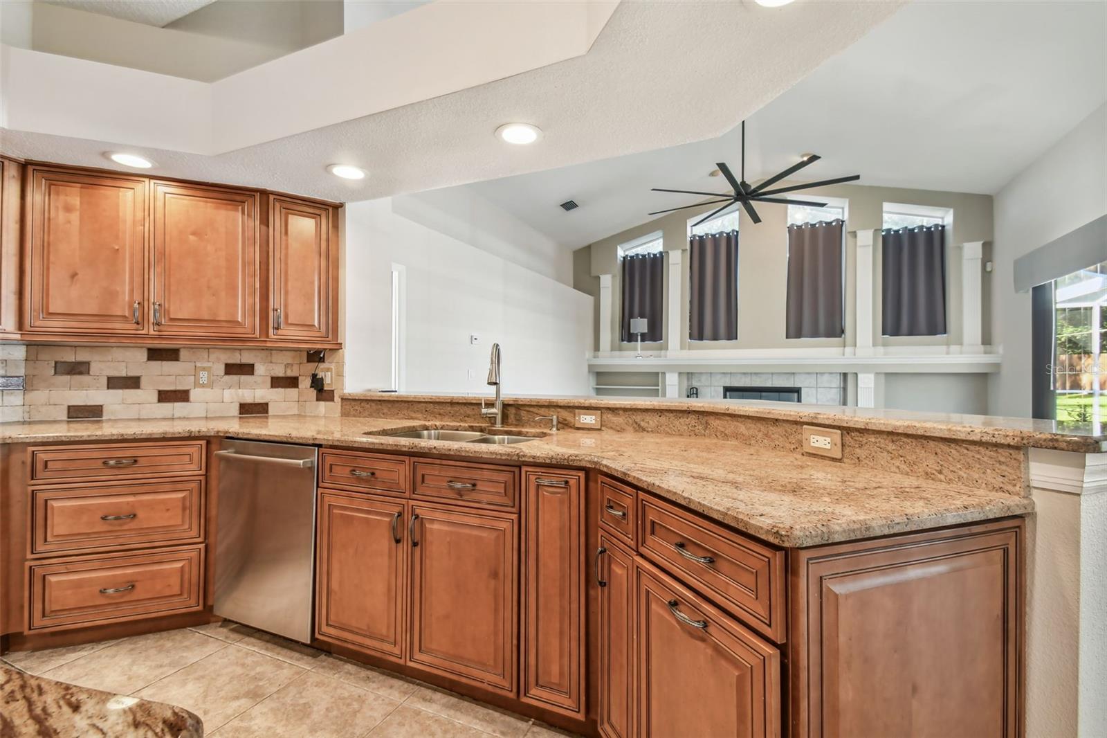 Kitchen overlooks the family room which makes for easy entertaining.