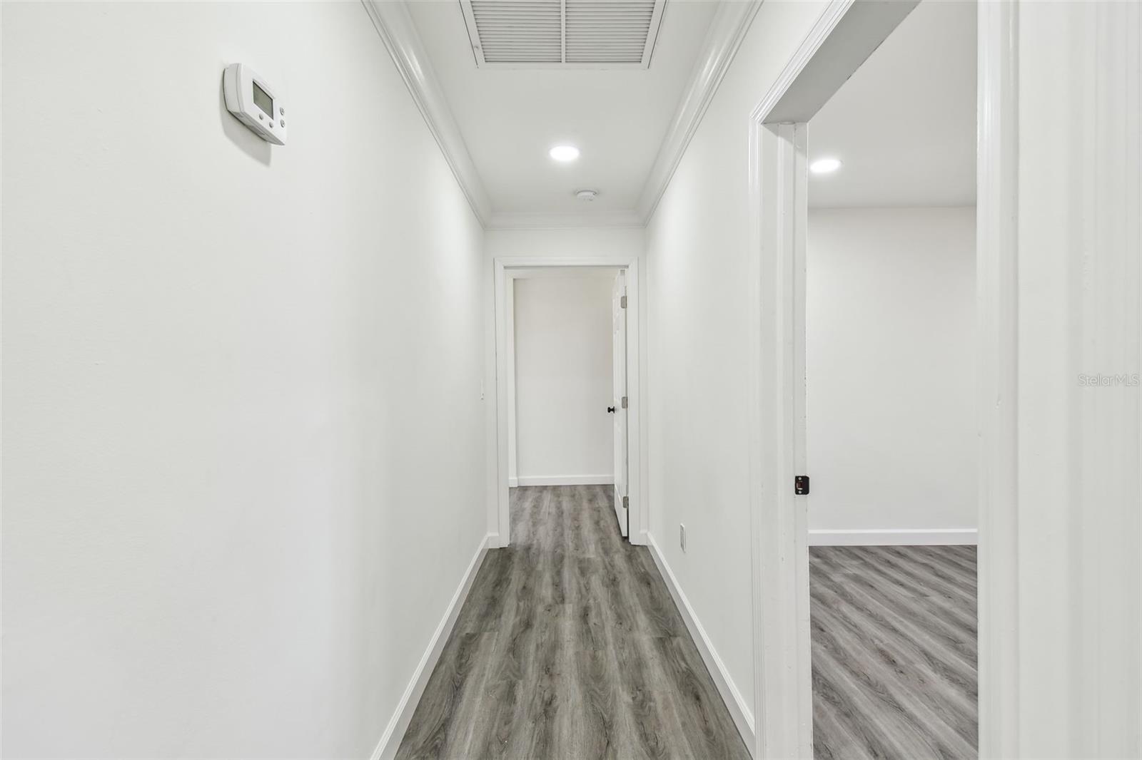 Hallway to Primary Bedroom and Bedroom 2.