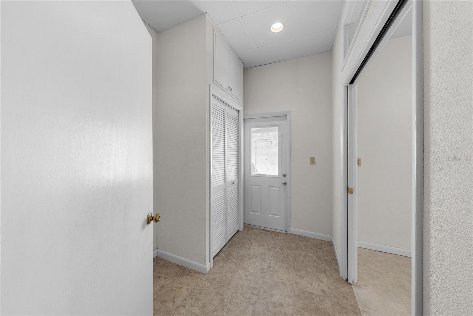 Off laundry room - Large office space with private side entrance and small waiting area