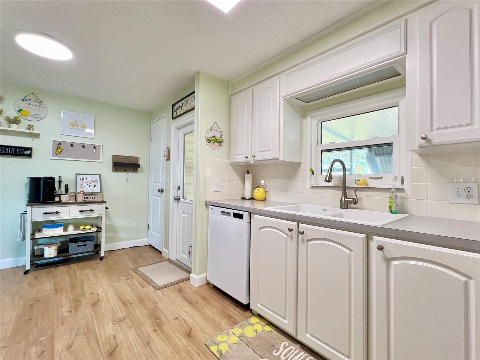 updated kitchen with window above sink