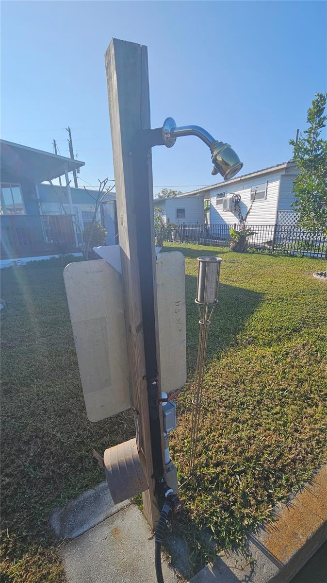 Shower & water access near boat lift area.