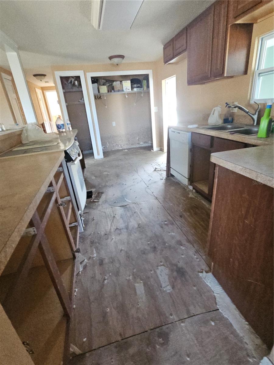 Kitchen area looking the other way towards the closet.