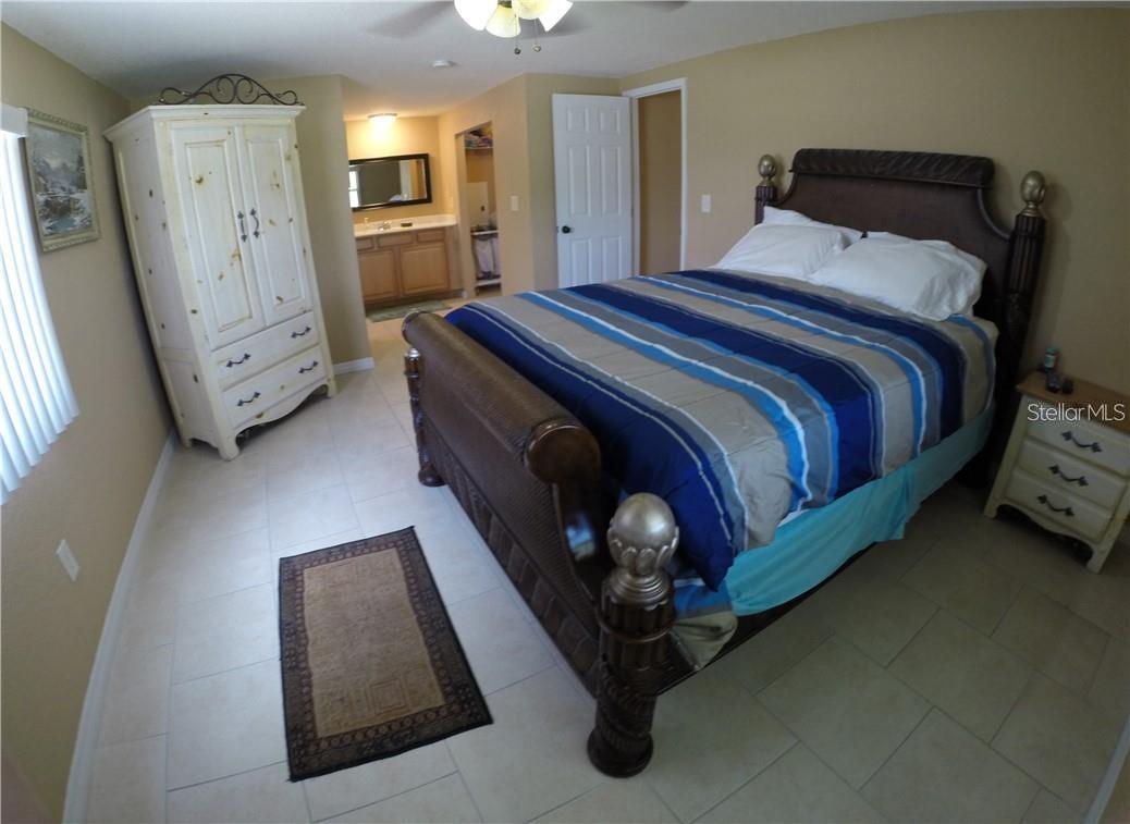 PRIOR - Master Bedroom looking toward the master bathroom & walk in closet