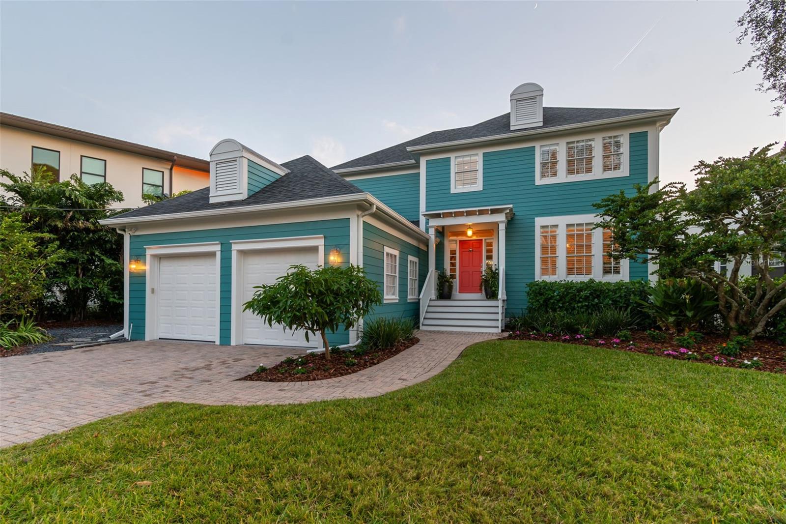 This Key West-style home is located on a quiet, dead end street and offers 4 bedrooms, 4.5 bathrooms, plus a dedicated office, and outdoor decks/balconies on each of the three floors allowing you ample opportunity to take in the tranquil surroundings.