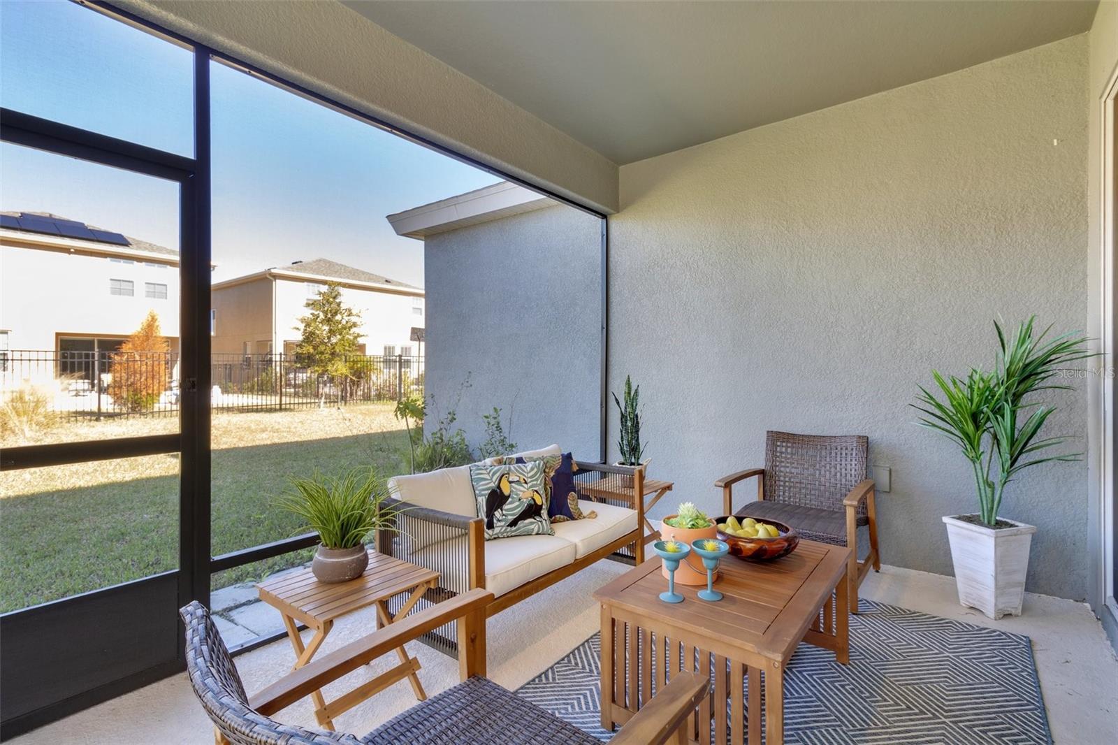 Spend time outdoors with the screened in lanai