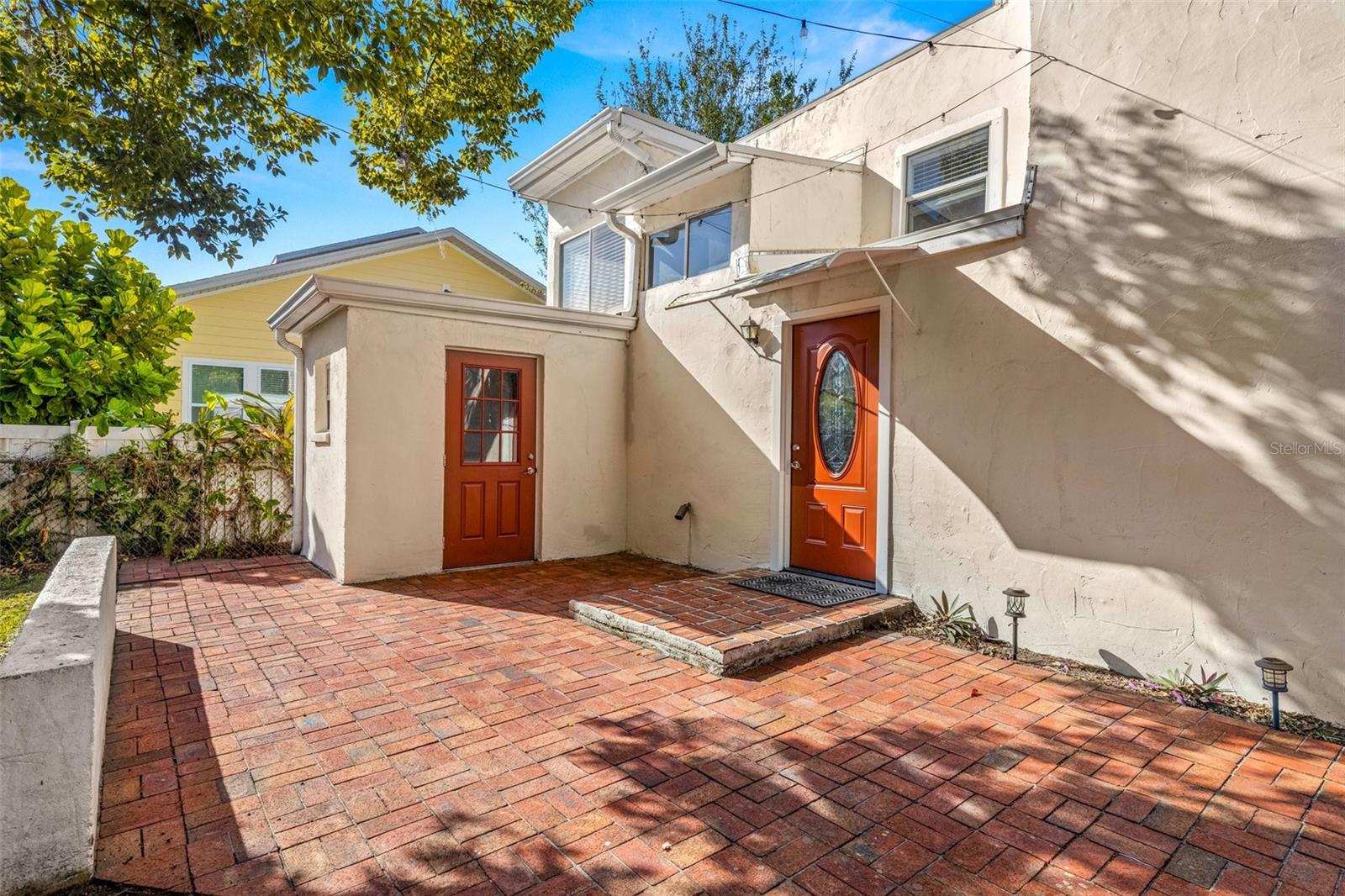 A few steps from the front door is the laundry room and additional storage.