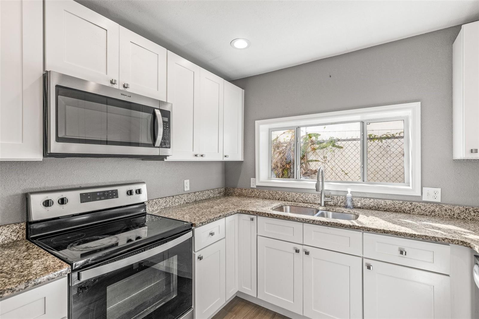 Lots of storage with plenty of cabinets above and below.