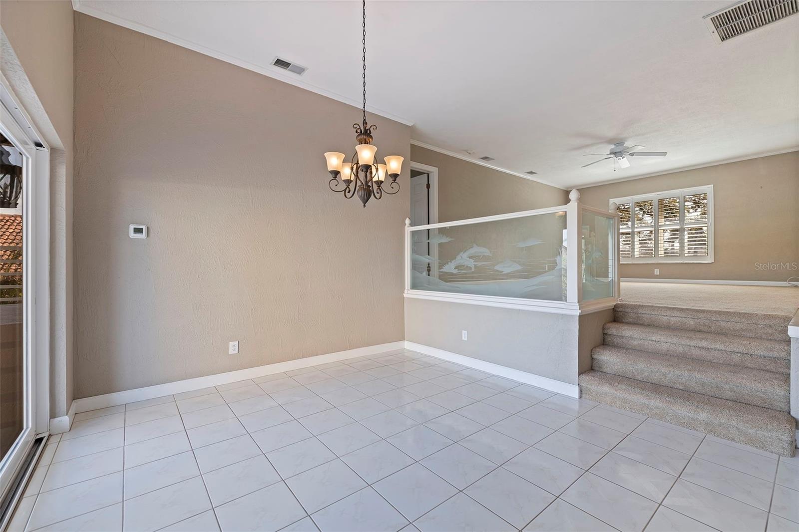 Dining room with view of family/flex room