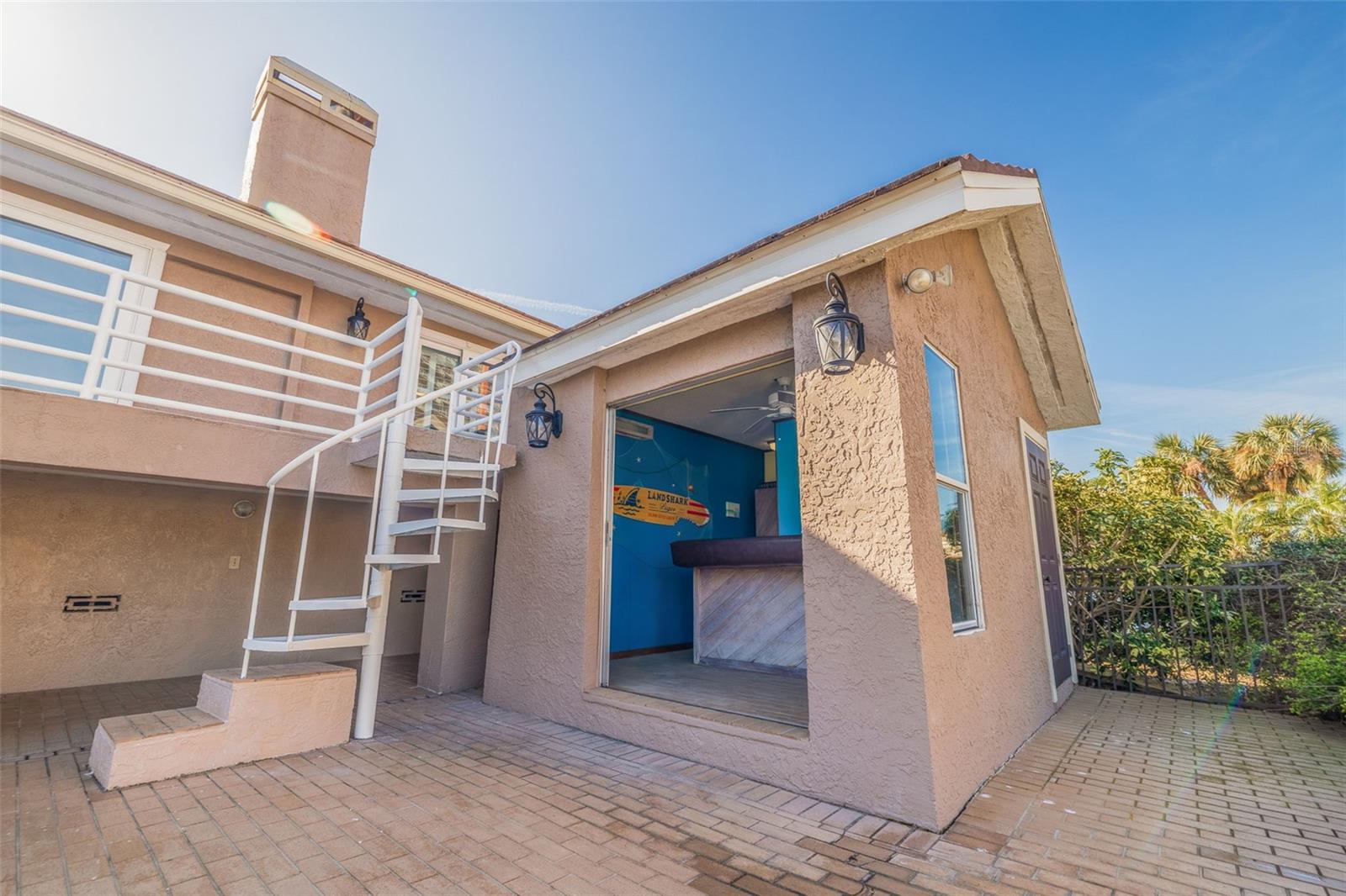 Cabana with spiral staircase to upper balcony