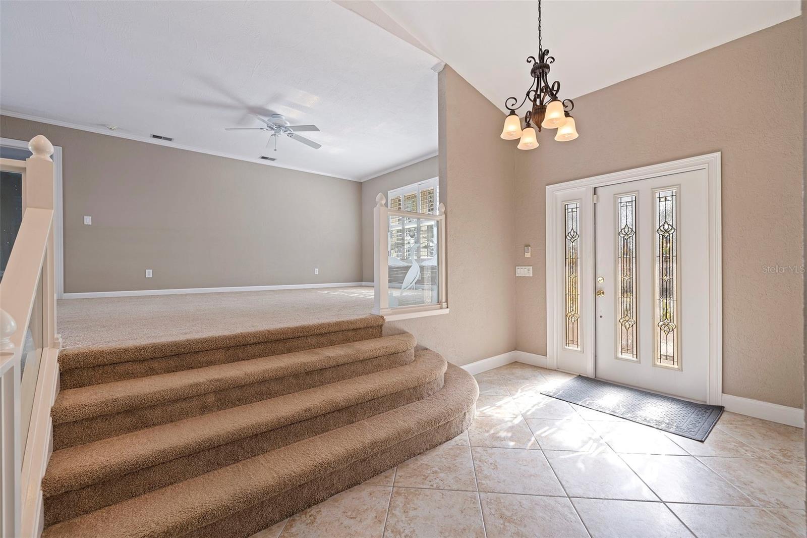 Main foyer with view of elevated family/flex room.