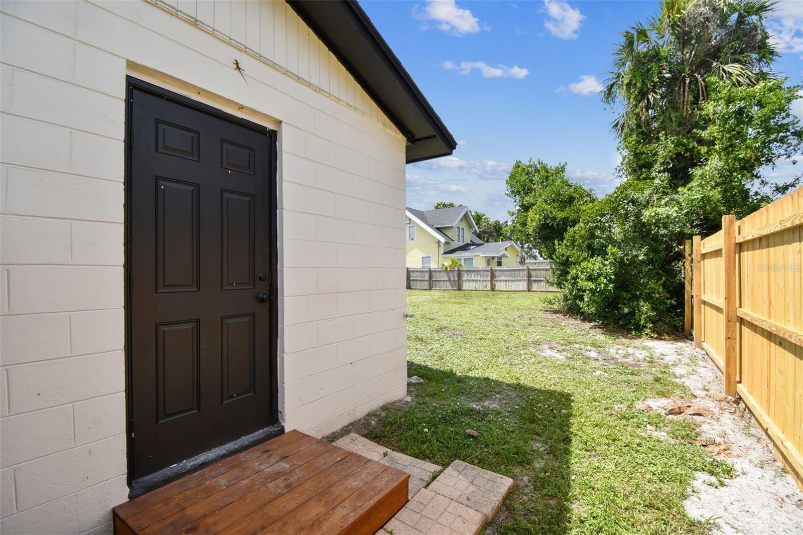 Backyard and side/rear entry, new fence