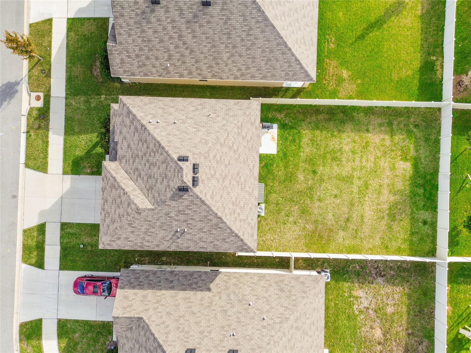 arial view of home and backyard