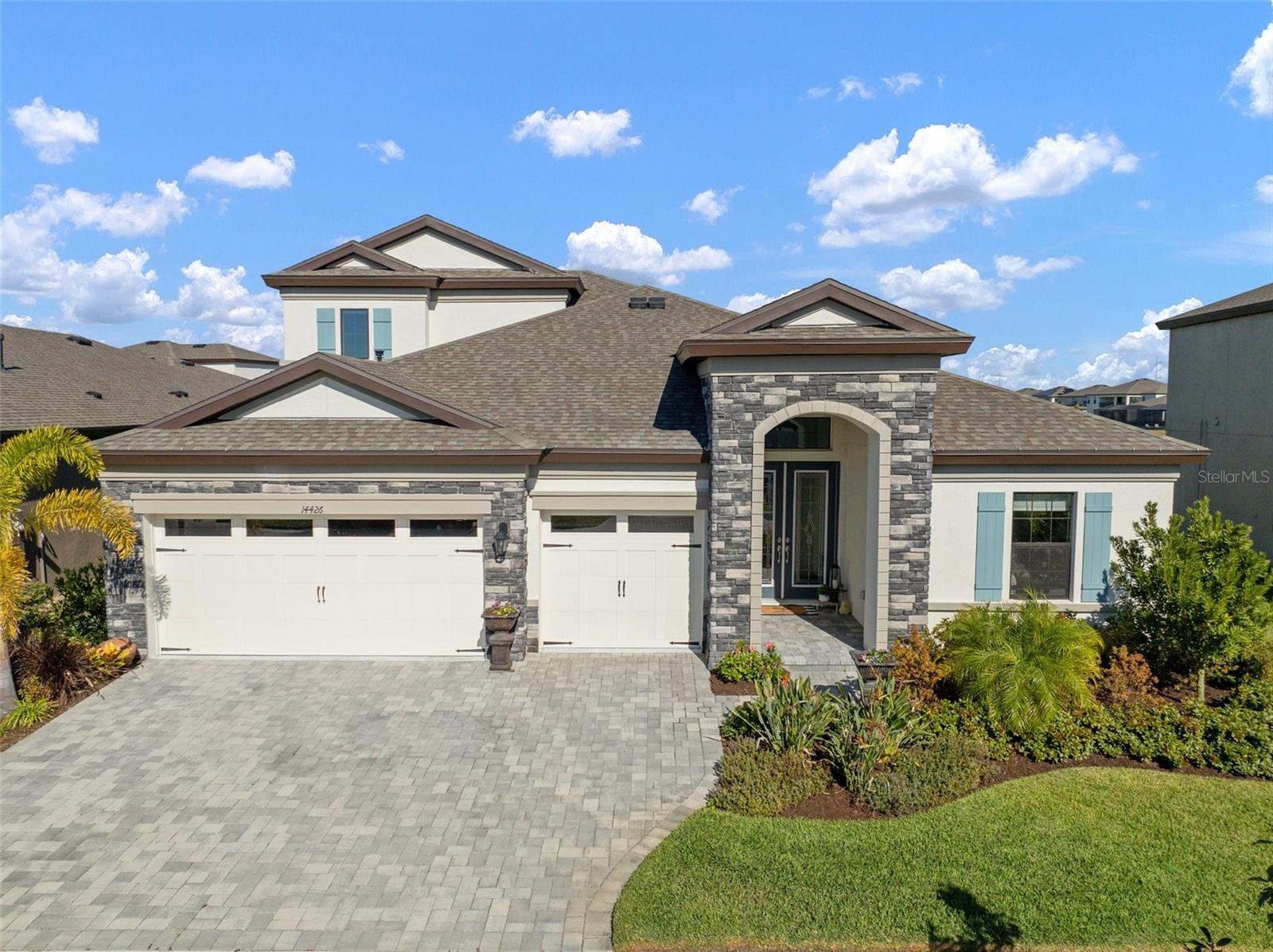 Front Elevation with Brick Paver Driveway