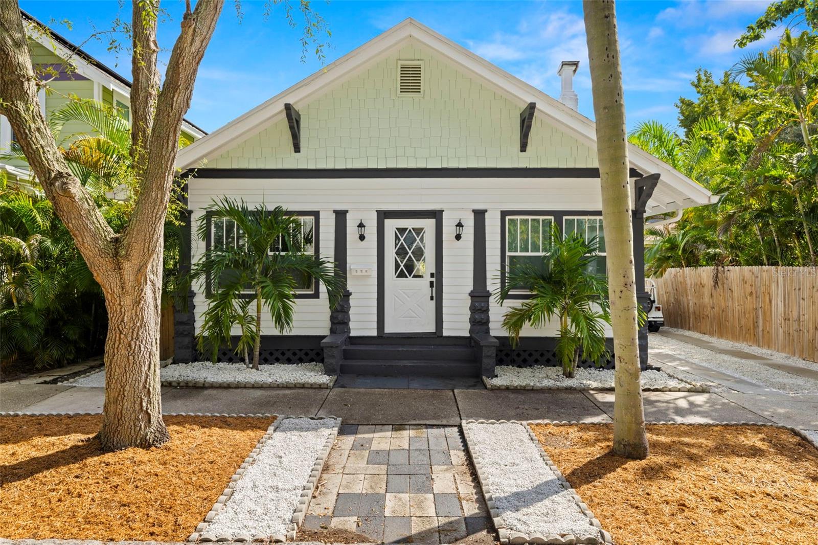 Your restored, meticulous 2BR/2BA bungalow awaits in Historic Uptown...Isn't it inviting?