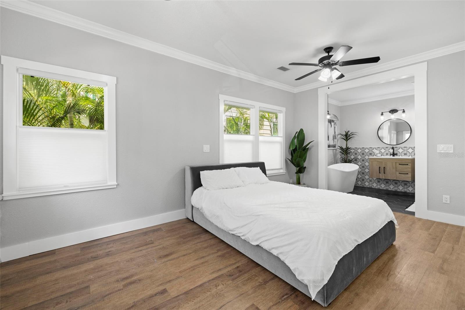 Spacious owner's suite at the front of the home.  Lots of windows so the bedroom is bathed in natural light!