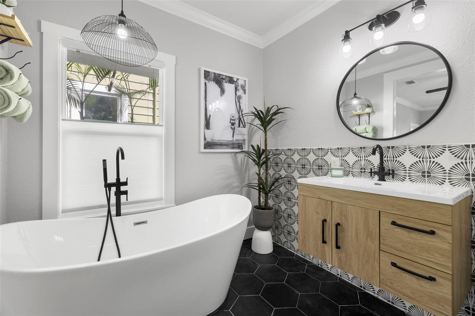 A modern, floating sink adds to the elegant look of your main bathroom.