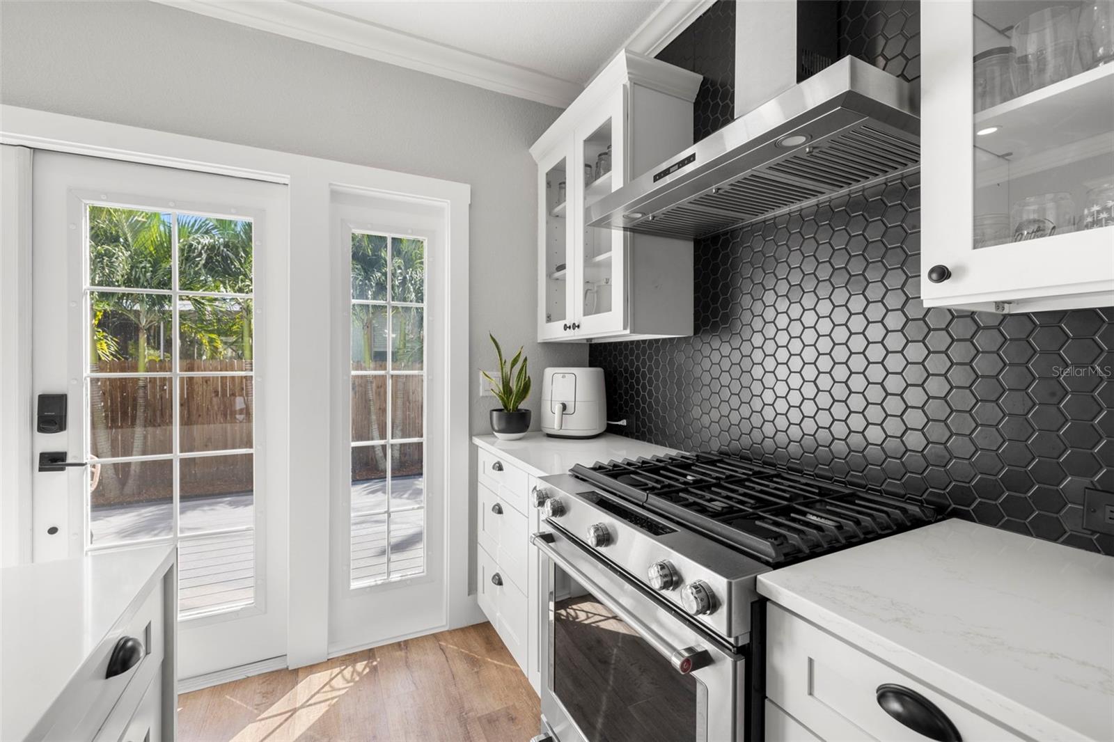 Worry-free stainless Whirlpool appliances complete the look...Gas range can help get your creative kitchen juices flowing...