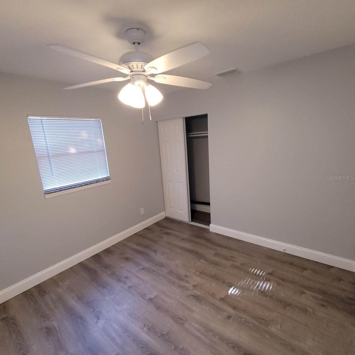 This is the larger bedroom (11X12) located at the front of the home.