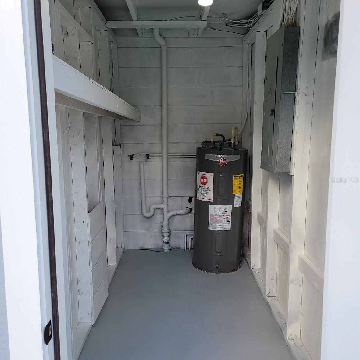 Just outside the family room is the utility closet that is still being painted. This room has the washer and dryer hook ups.