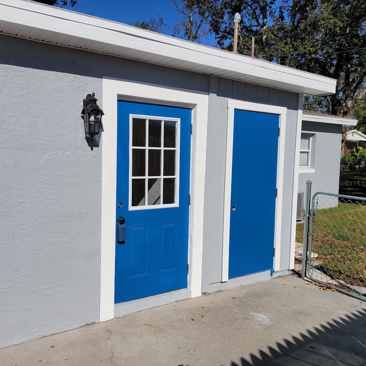 The left door also leads to the family room. The right side door leads to the utility room_ laundry.