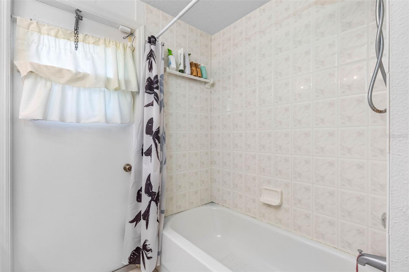 shower/tub combo hall bathroom