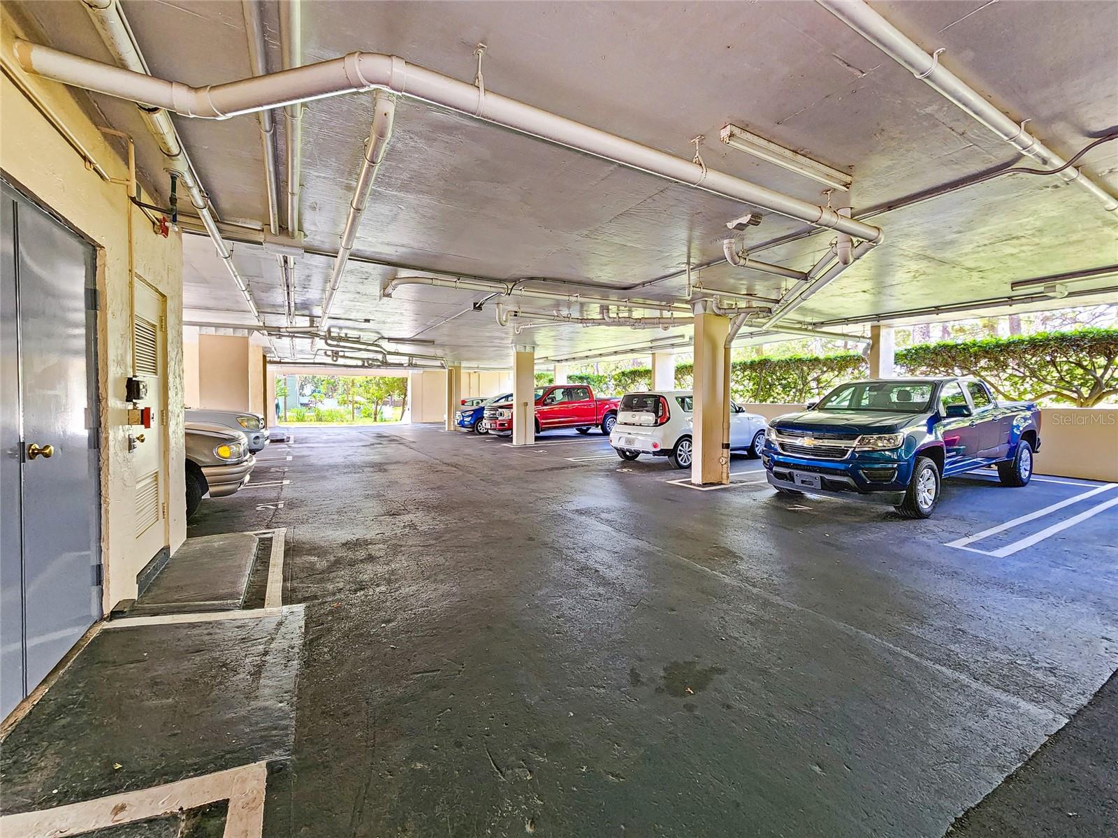 Garage under bldg with assigned parking space