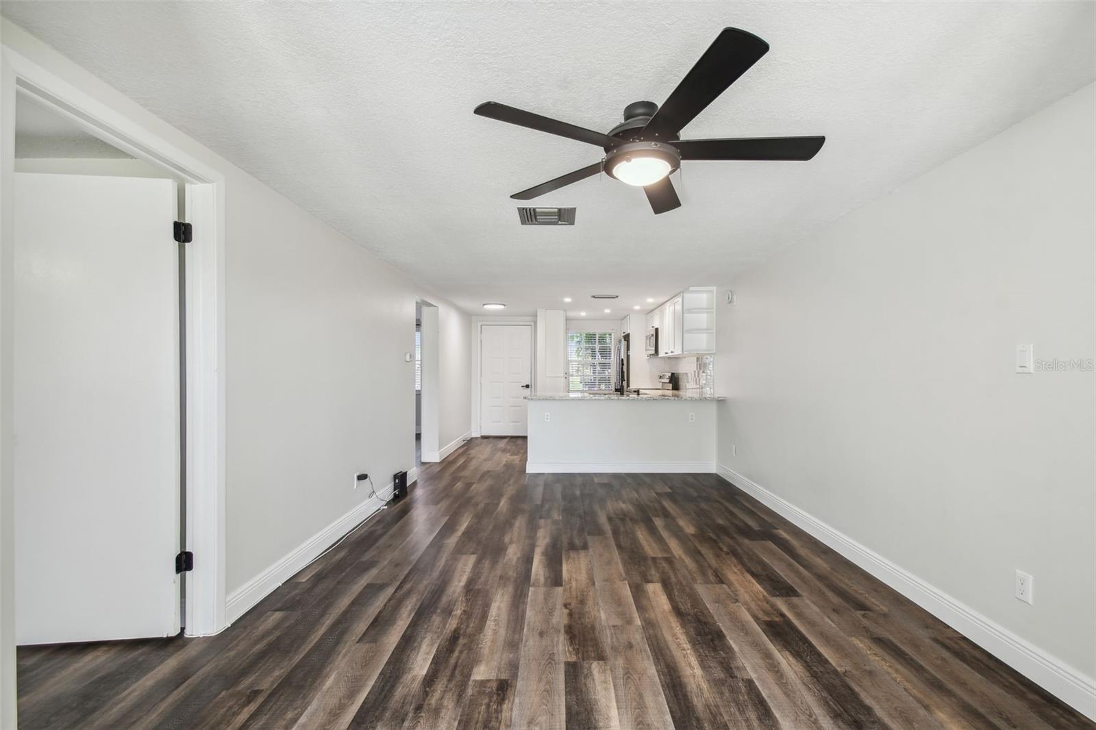 NEW LUXURY VINYL PLANK FLOORING THROUGHOUT + FRESHLY PAINTED INTERIOR