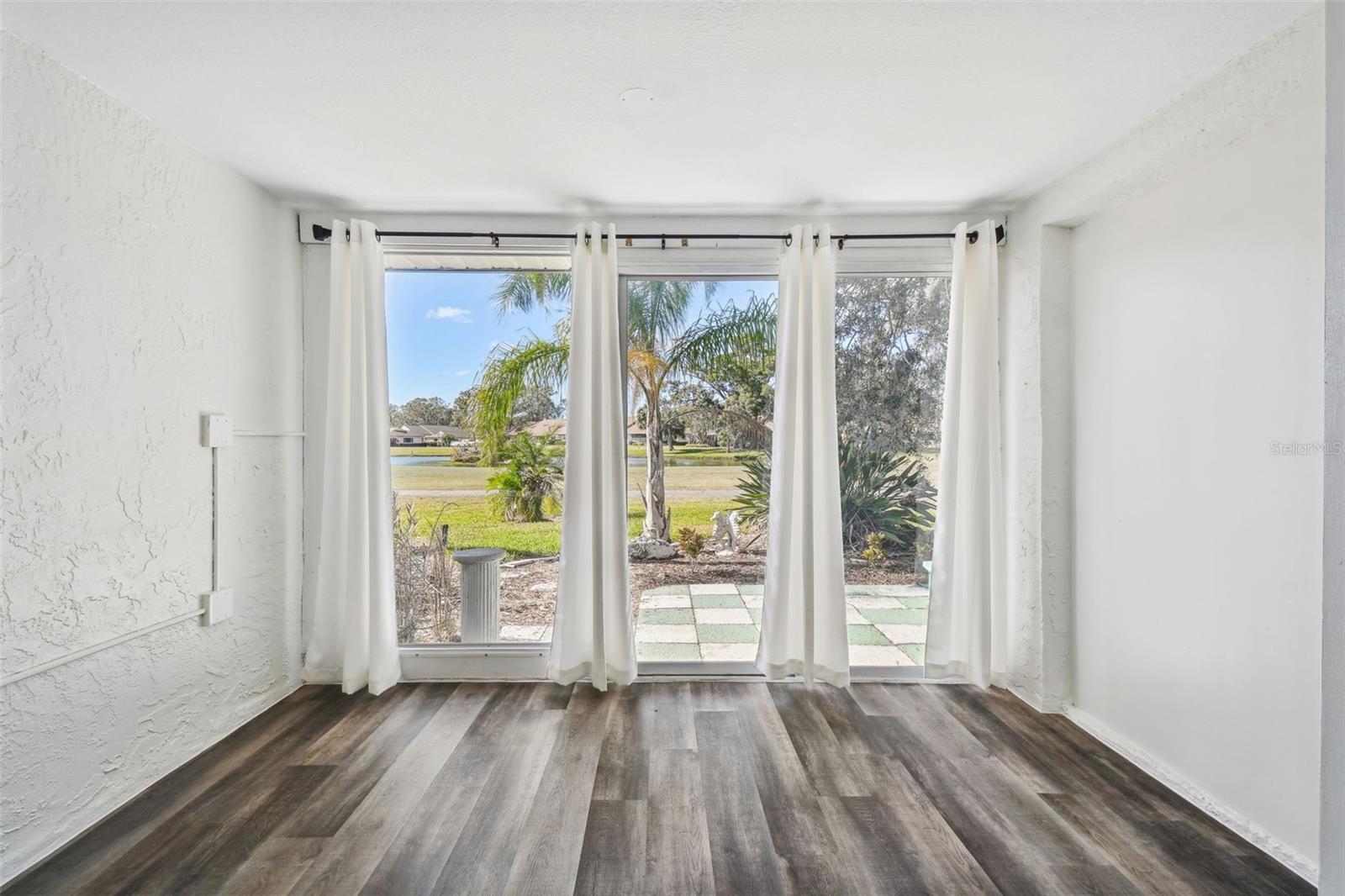 Sliding Glass Door leads you onto patio overlooking the golf course.