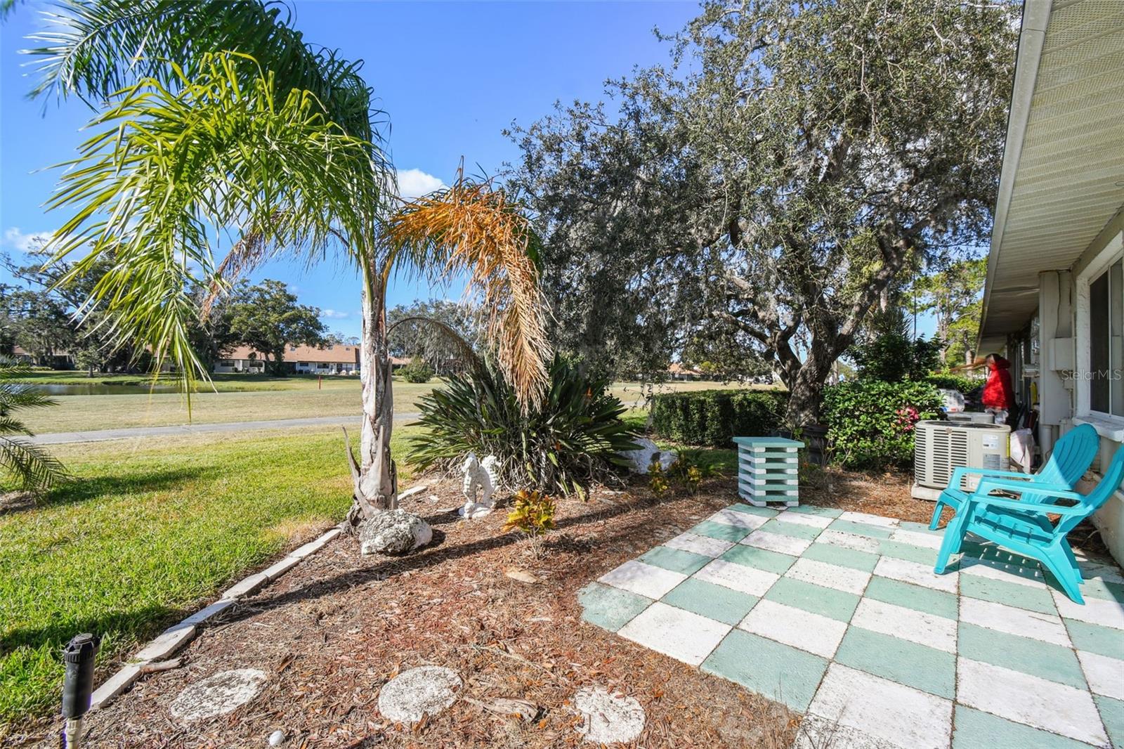 Rear patio with golf course views.