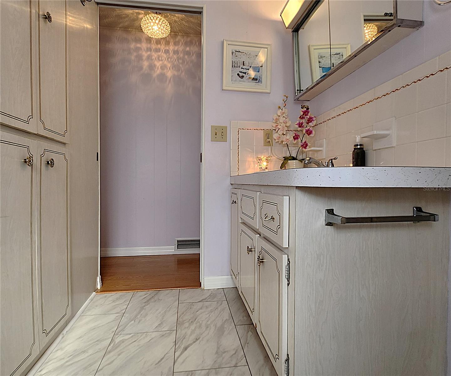 Master bath includes a tiled shower and bathtub