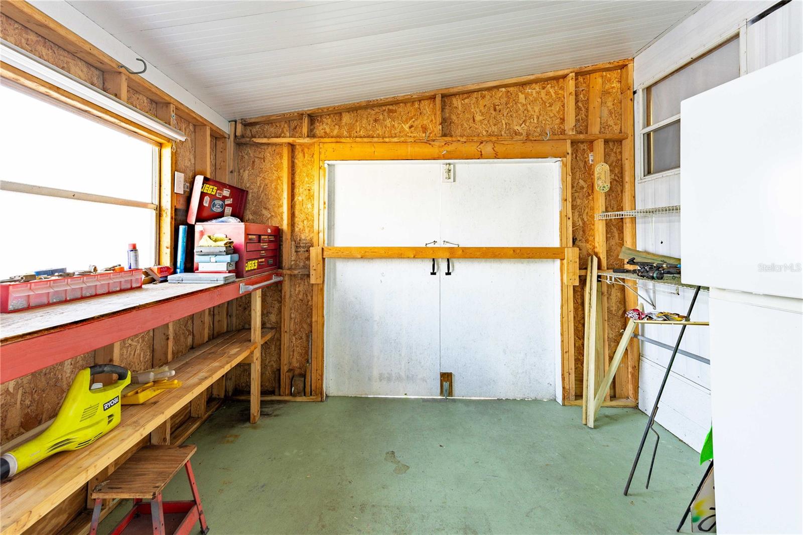 Attached shed/ workshop/storage.