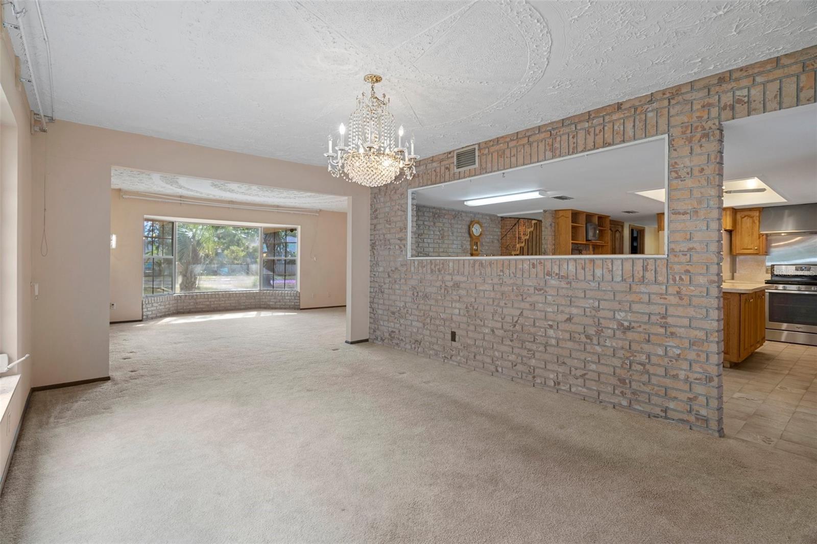 Dining room adjacent to kitchen and off of living room