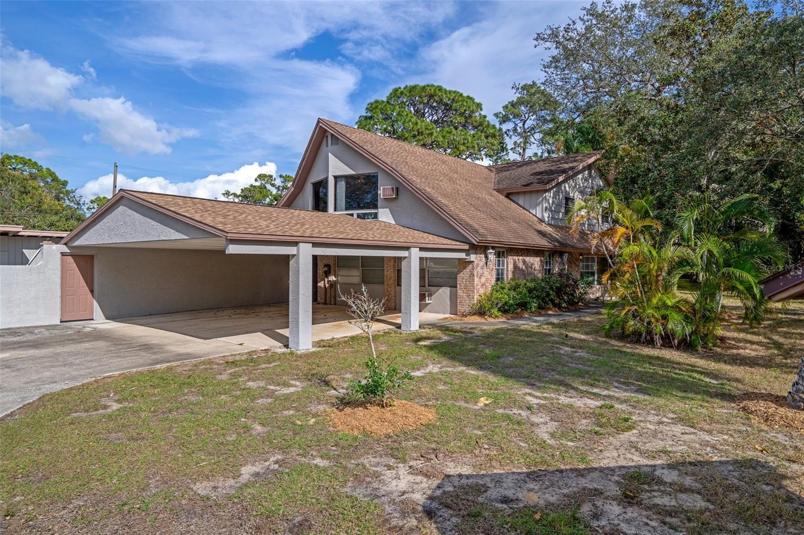 Carport on side of home