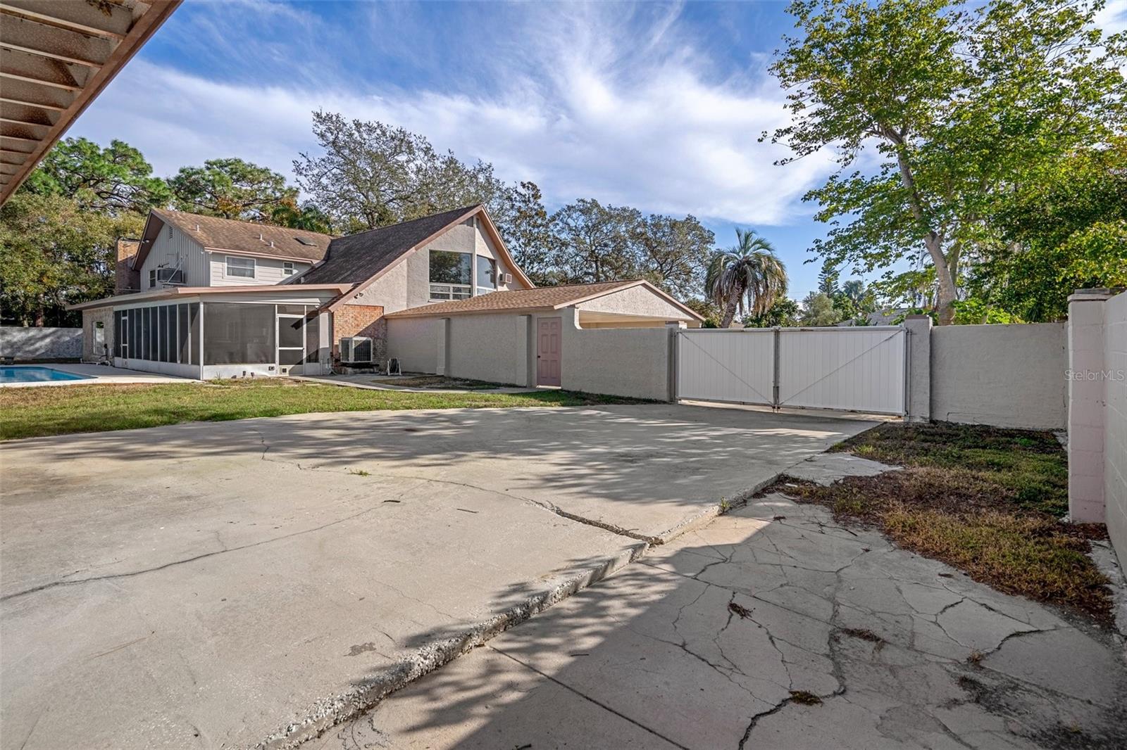 backyard driveway to detached garage