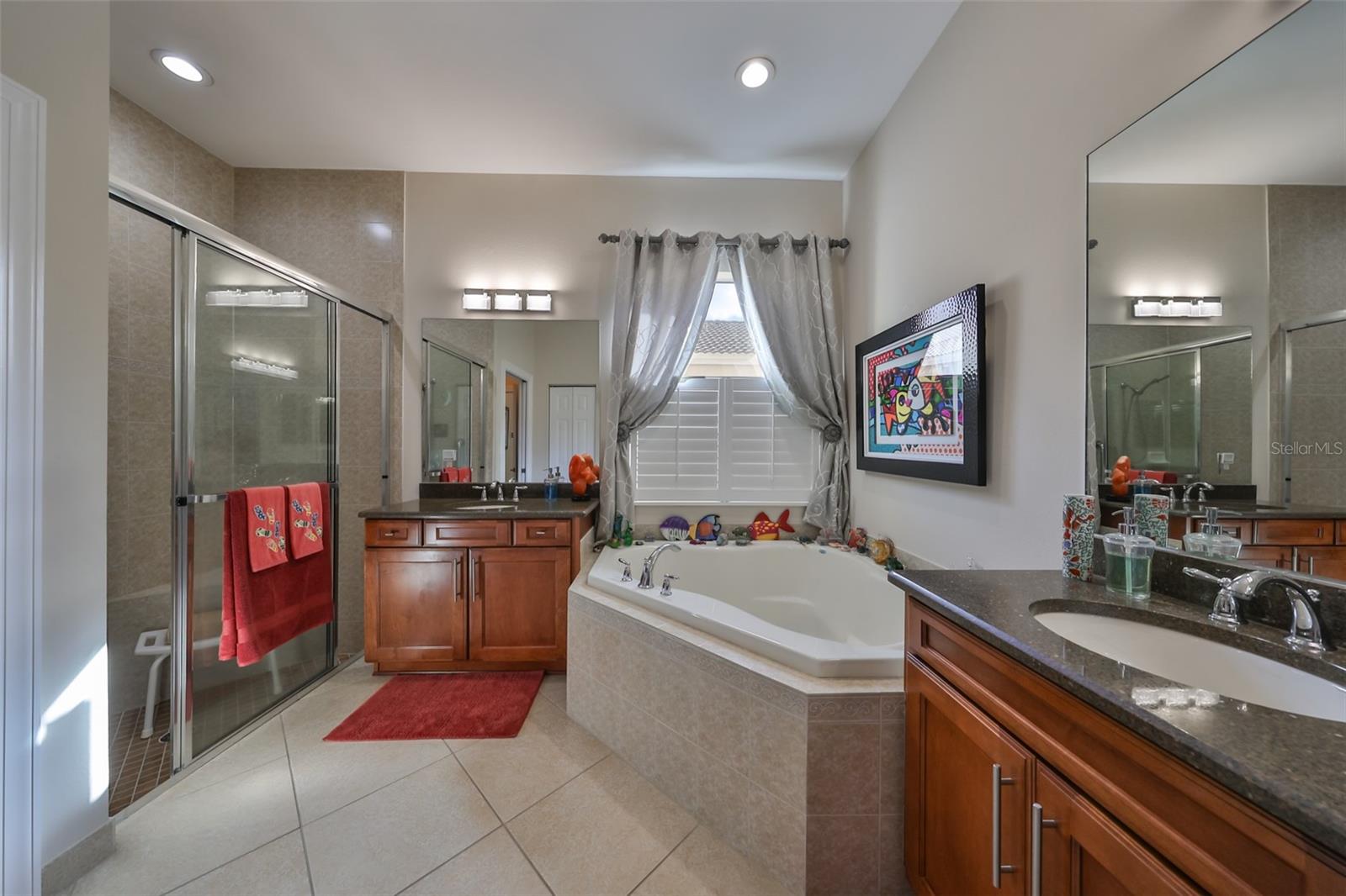 Primary Bath with walk in shower, double sinks and a soaking tub