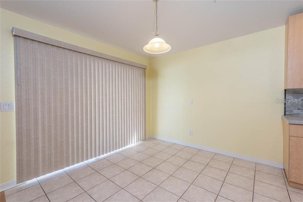 dining area, that leads to patio