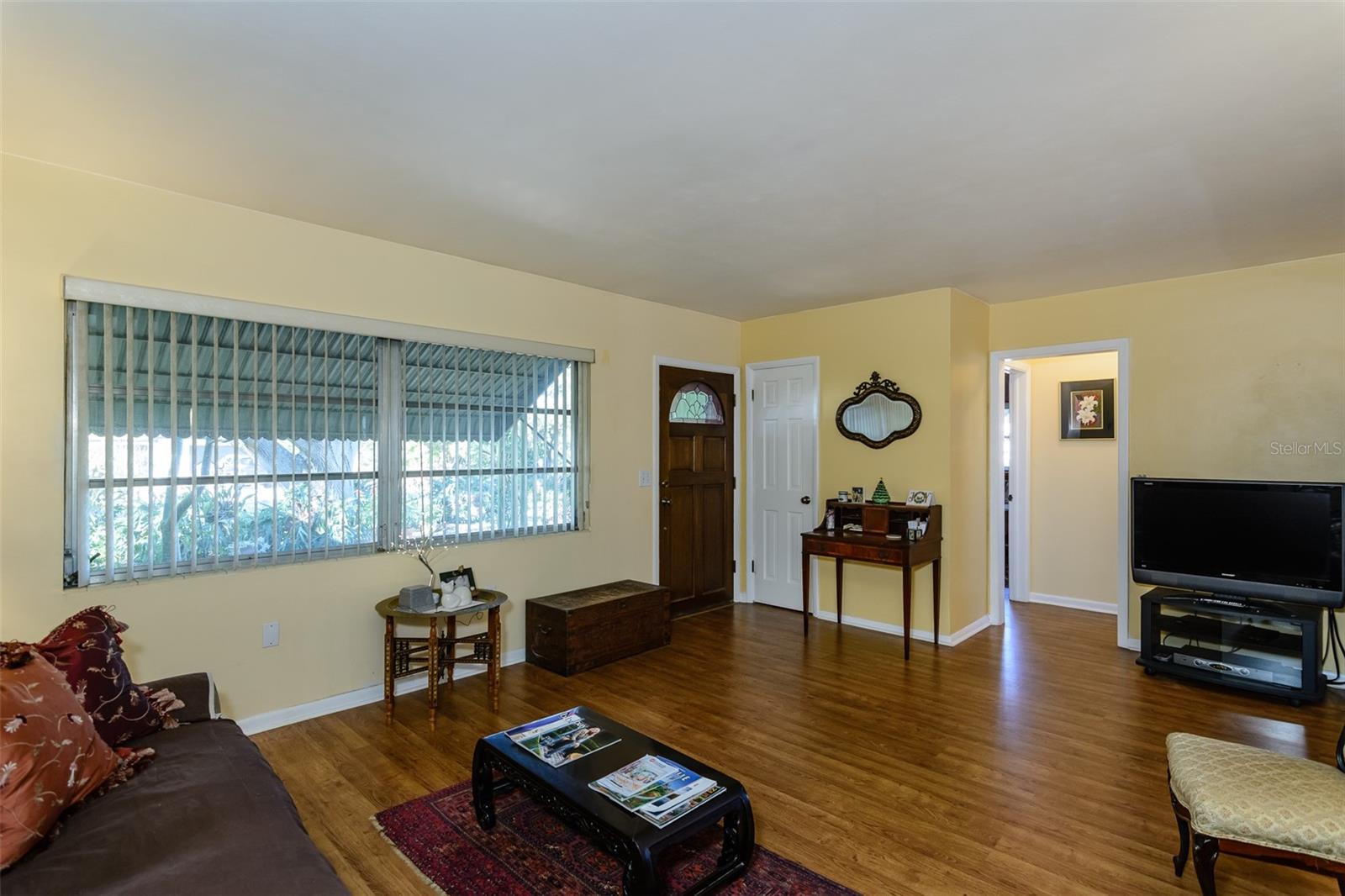 Newer luxury laminate floors shine throughout the home.