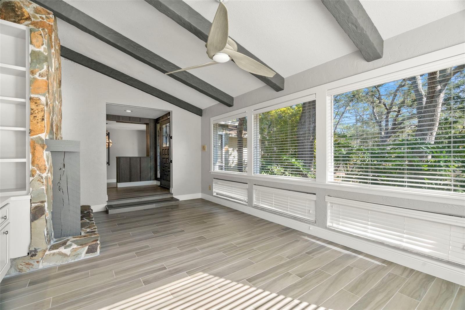 A bonus room with vaulted ceilings has been designed as a dream home office.