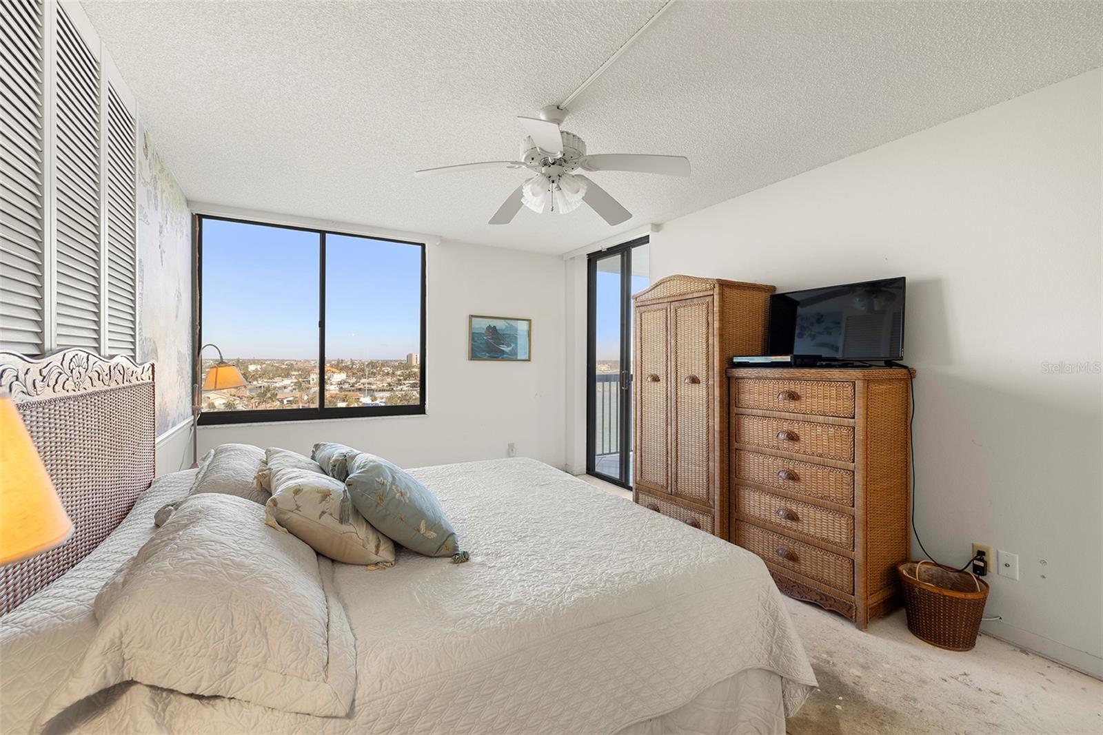 Master bedroom has a view of the water