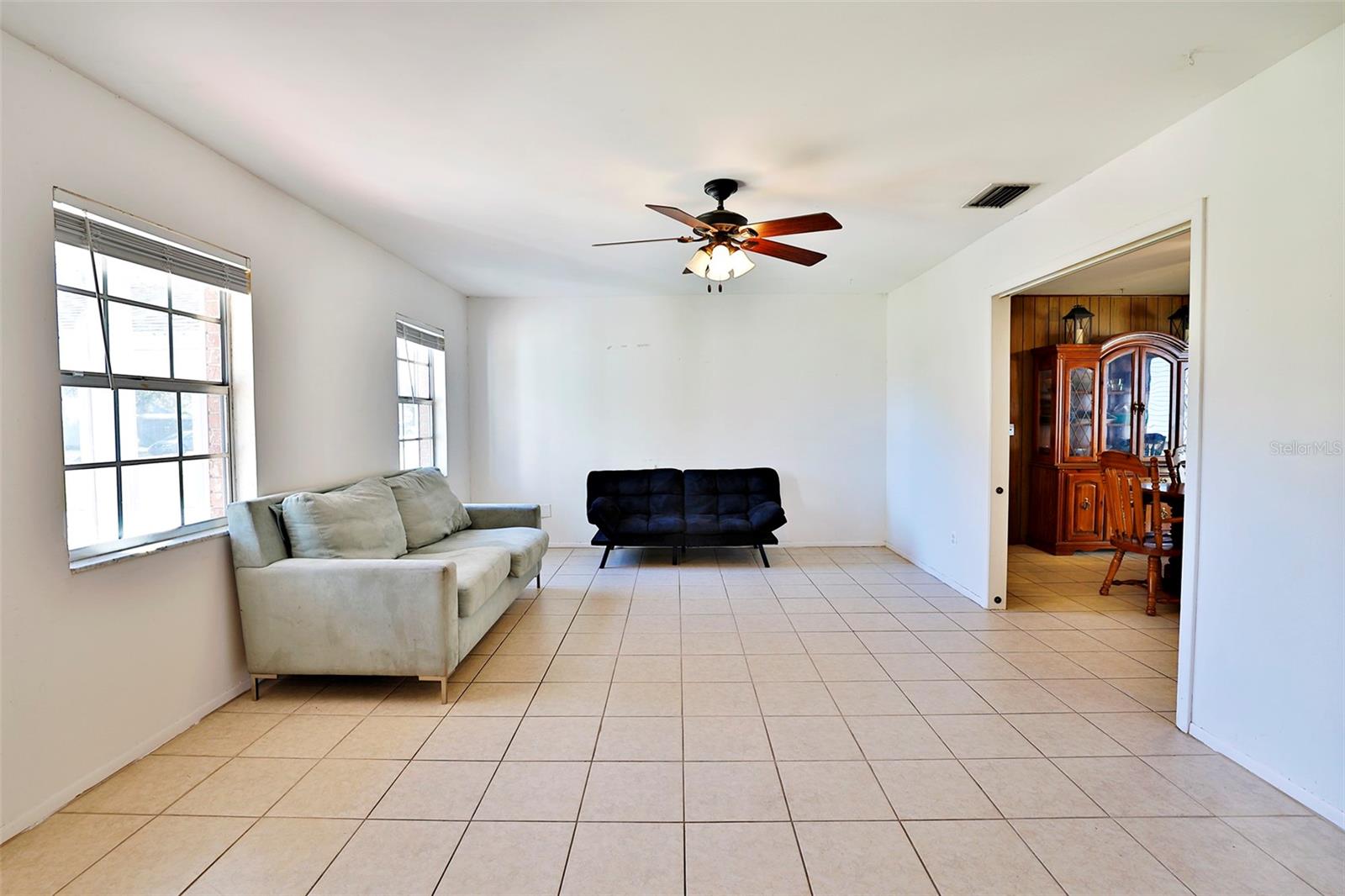 Living room w/dining room entry on right