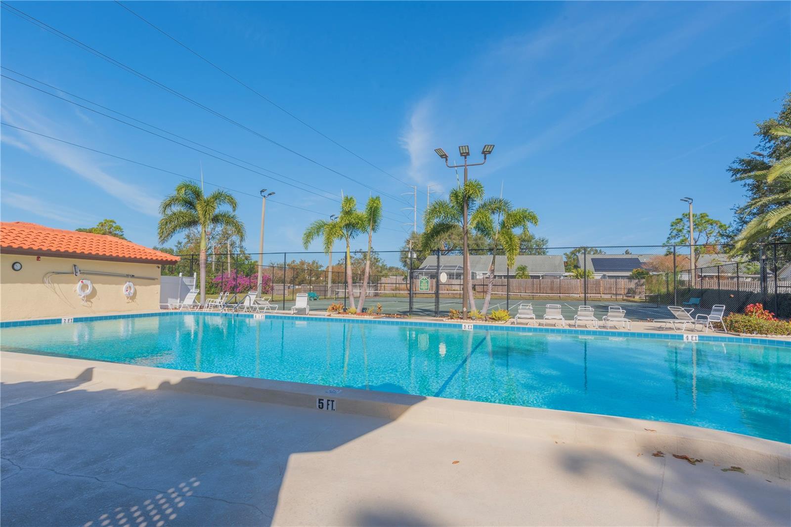 Community pool and tennis / pickleball courts.