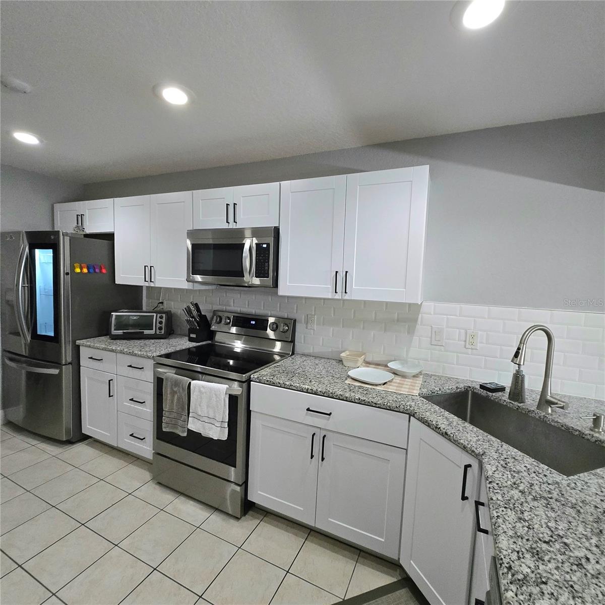 New kitchen cabinets, counters and top-of-the-line appliances