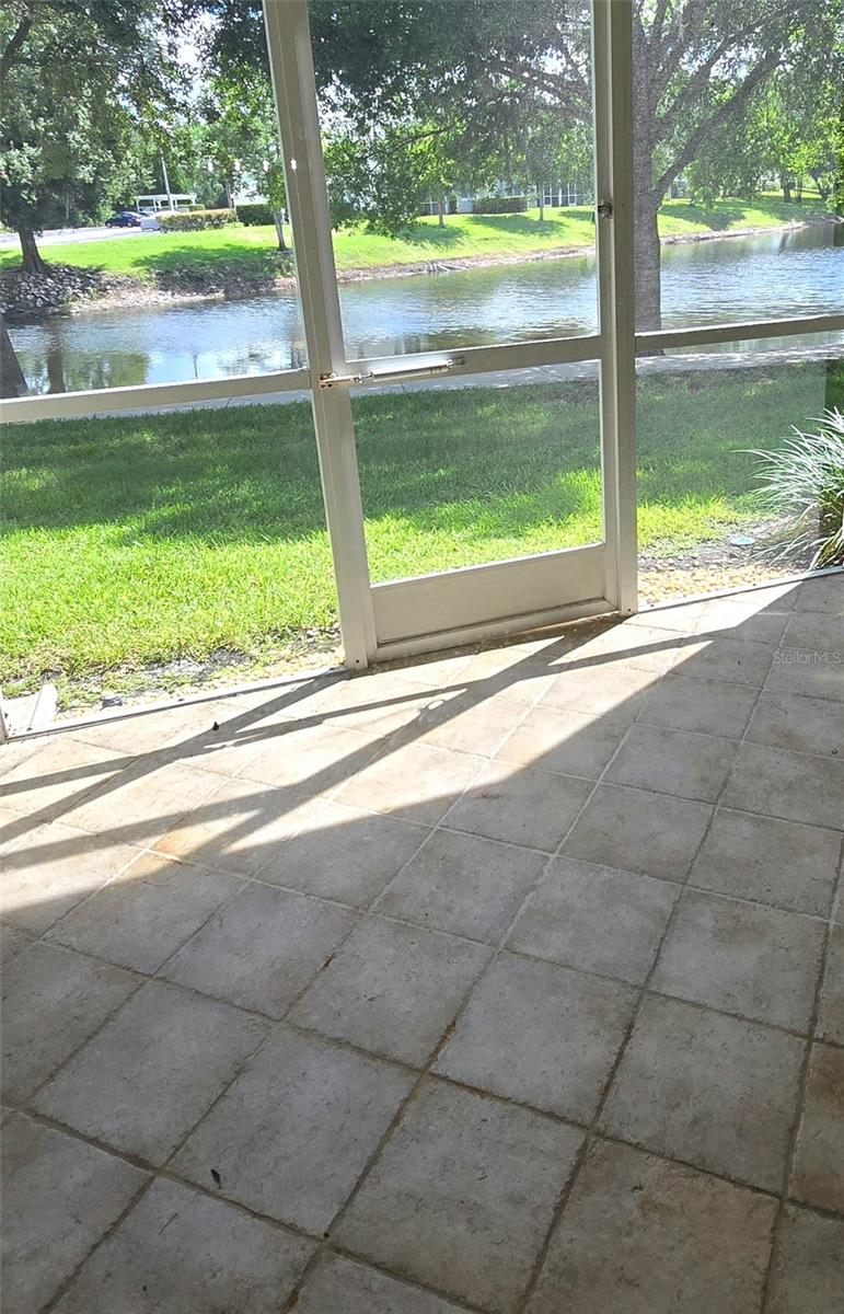 Pond view from screened-in patio