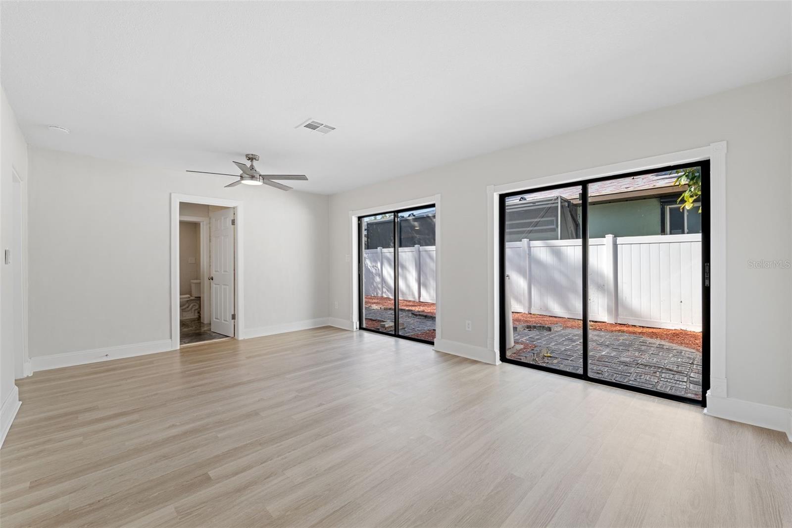 Downstairs renovated master bedroom with private entrance